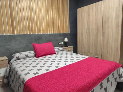 Cama o camas de una habitación en El LEGADO