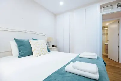 Cama o camas de una habitación en Hostly Sol 2bdr flat with patio in Seville center