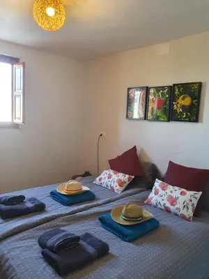 Cama o camas de una habitación en Casita of Casa Olivar
