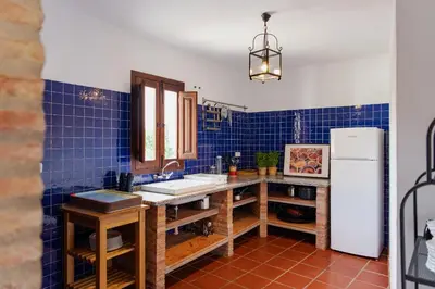Una cocina o zona de cocina en Finca El Almendrillo