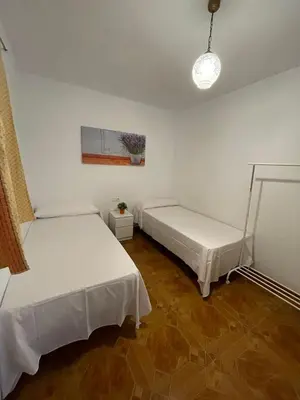 Cama o camas de una habitación en Casa Rural Los Caballos Finca Canca Alora Caminito del Rey