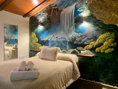 Cama o camas de una habitación en Apartamentos3Cuevas