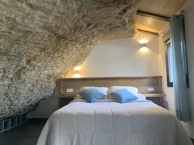 Cama o camas de una habitación en Apartamentos3Cuevas
