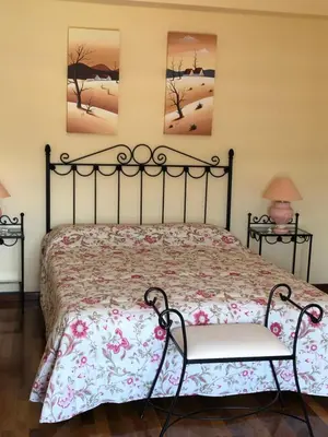 Cama o camas de una habitación en La casa de Tita Elvira 4