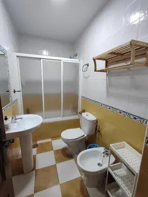Un baño de Pensión y apartamentos El Taxi