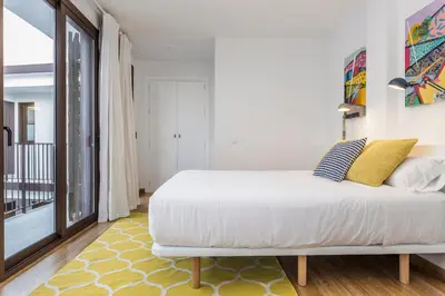 Cama o camas de una habitación en Pop Art, Dúplex coqueto en el corazón de Sevilla