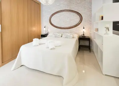 Cama o camas de una habitación en APARTAMENTOS LOS MORILES