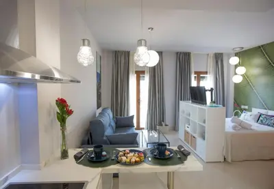 Cama o camas de una habitación en APARTAMENTOS LOS MORILES