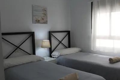 Cama o camas de una habitación en PISO EN PLENO CORAZÓN DE CORDOBA