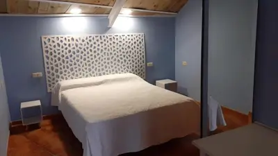Cama o camas de una habitación en Casita para dos con piscina privada