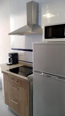 Una cocina o zona de cocina en Apartamento Centro Santa Catalina 1ºA