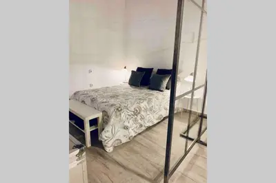 Cama o camas de una habitación en Loft exclusivo en el centro histórico de Sevilla