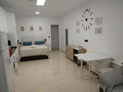 Cama o camas de una habitación en Apartamentos Cordoba