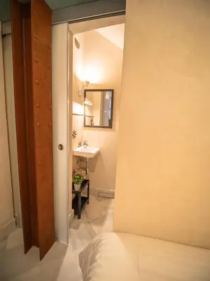 Cama o camas de una habitación en Casas de Sevilla - Apartamentos Vidrio 7
