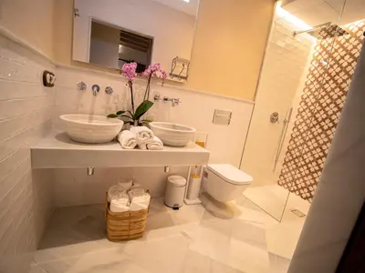 Un baño de Casas de Sevilla - Apartamentos Vidrio 7