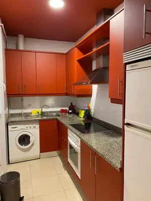 Una cocina o zona de cocina en Ritual Sevilla Suites Alameda 1