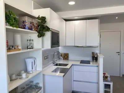 Una cocina o zona de cocina en Residencial Santa Justa - Vacacional Sevilla