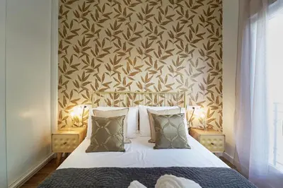 Cama o camas de una habitación en El Coso Boutique Lucena