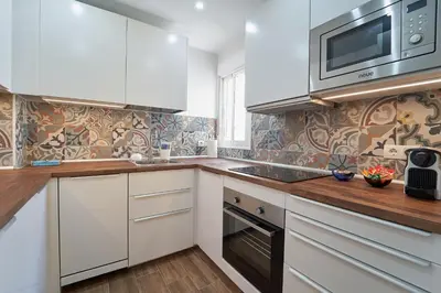 Una cocina o zona de cocina en El Coso Boutique Lucena