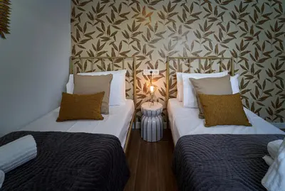 Cama o camas de una habitación en El Coso Boutique Lucena