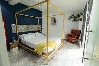 Cama o camas de una habitación en Singular Home Sevilla Center Bikes free