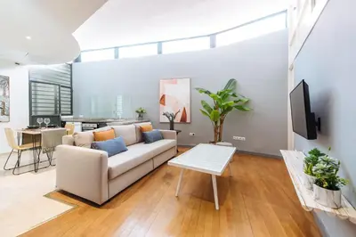 Una televisión o centro de entretenimiento en Conde de Ibarra Suite Apartment