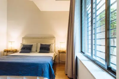 Cama o camas de una habitación en Conde de Ibarra Suite Apartment