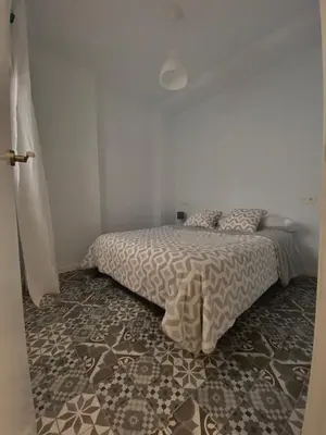 Cama o camas de una habitación en Casa Las Gardenias