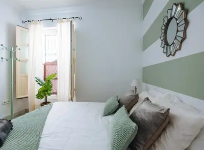 Cama o camas de una habitación en Lanza Suite Apartment