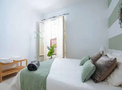 Cama o camas de una habitación en Lanza Suite Apartment