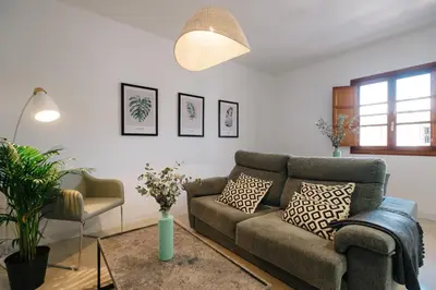 Zona de estar de Encarnación Suite Apartment