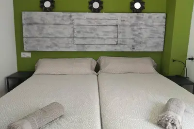 Cama o camas de una habitación en Apartamento Centro Encarnación 1º D