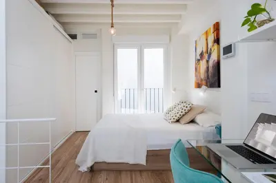 Cama o camas de una habitación en Alohamundi Alameda III