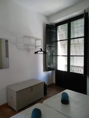 Cama o camas de una habitación en Apartamento Centro Encarnación 1º I