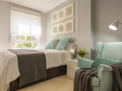 Cama o camas de una habitación en Misterhost San Bernardo Jardines de Murillo