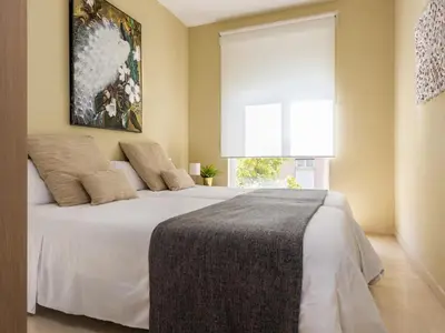 Cama o camas de una habitación en Misterhost San Bernardo Jardines de Murillo
