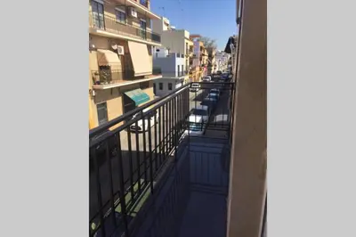 Un balcón o terraza de CASA REFORMADA CON TERRAZA/WIFI/AIRE ACONDICIONADO