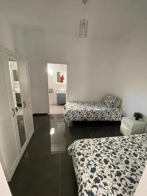 Cama o camas de una habitación en CASA REFORMADA CON TERRAZA/WIFI/AIRE ACONDICIONADO