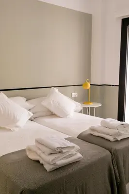 Cama o camas de una habitación en Pasaje Zamora Apartamentos