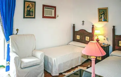 Cama o camas de una habitación en CASA RURAL LA FLORIDA, MORÓN de la FRONTERA