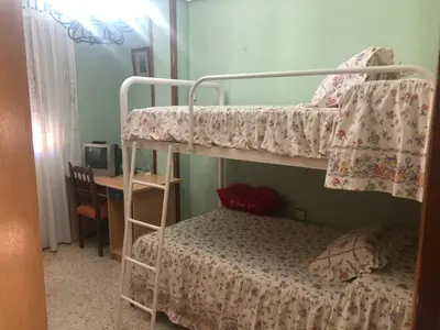 Cama o camas de una habitación en ALOJAMIENTO LA EXPLANADA