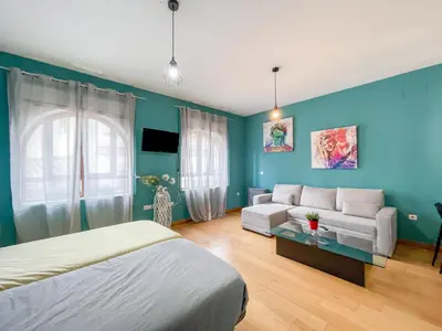 Cama o camas de una habitación en ESSE Apartamentos Las Setas