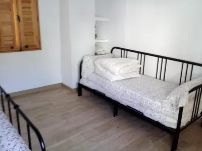 Cama o camas de una habitación en La Casita Tipica