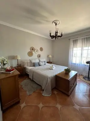 Cama o camas de una habitación en CASA RURAL EL CHAPARRO