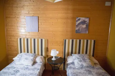 Cama o camas de una habitación en EL VENERO DE MOSTOLES
