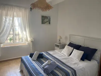 Cama o camas de una habitación en Cortijo Las Palmeras El Chorro