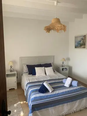 Cama o camas de una habitación en Cortijo Las Palmeras El Chorro