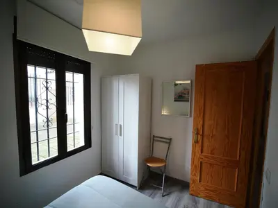 Cama o camas de una habitación en Calle San Basilio - Patios. Aparcamiento gratis