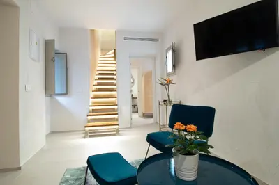 Una televisión o centro de entretenimiento en Casa 95 Sevilla