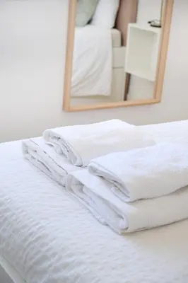 Cama o camas de una habitación en AOVE Suite